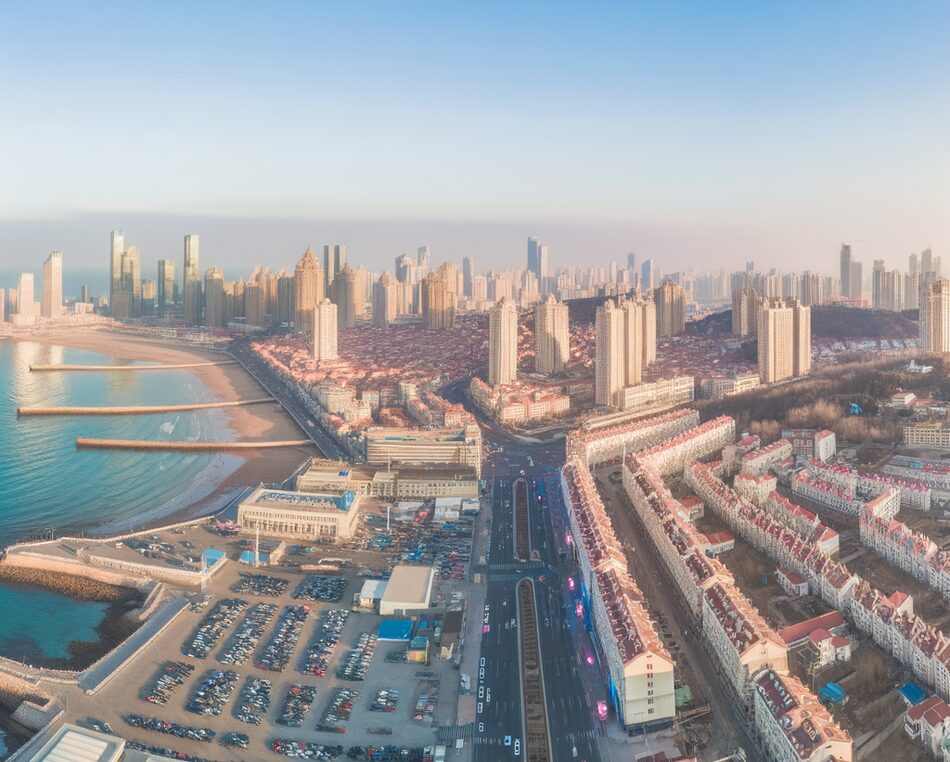 Panoramic cityscape of Qingdao, China — key market for foreign direct investment